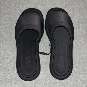 9. PADDED FLAT SLIDER SANDALS WITH TRACK SOLE